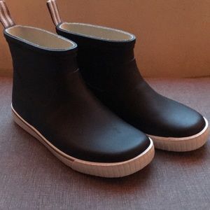 Tretorn 38 black wings lag ankle rain boots.